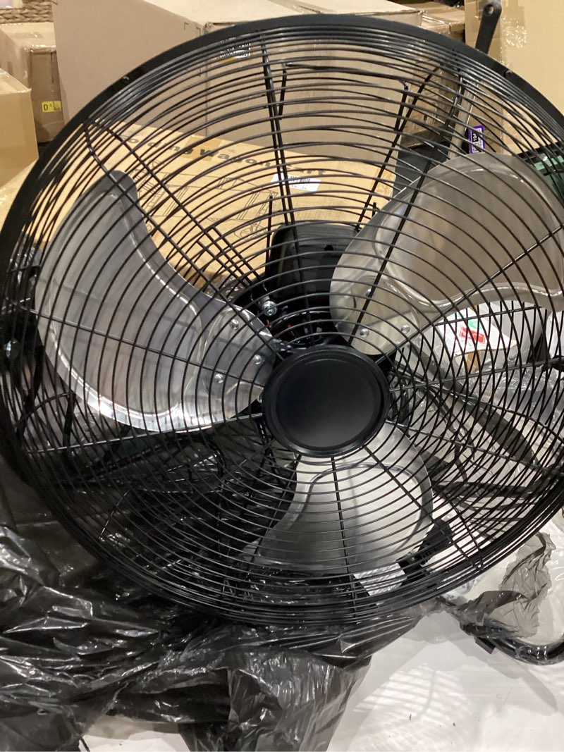 Condition photo showing As Is for mainstays 20" 3-speed high velocity tiltable black steel floor fan