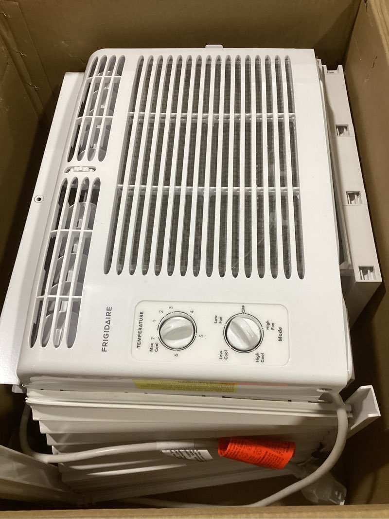 Condition photo showing Good Condition for frigidaire 5,000 btu window-mounted air conditioner, cools up to 150 sq. ft., quiet operation, effortless temperature control, 2 fan speeds, auto restart, white 5,000 btu mechanical controls