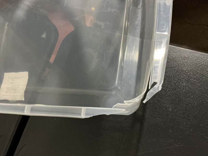 Condition photo showing As Is for project source x-large 17.5 -gallons ( 70 -quarts ) clear stackable underbed tote with standard snap lid