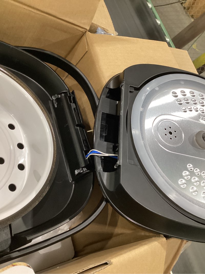 Condition photo showing As Is for (LID IS DAMAGED) AROMA® 6-Cup (Uncooked)/ 12-Cup (Cooked) Slow Cook Rice Cooker and Brown Rice Cooker with Lift-Out Pot Handles and Silicone Storage Lid, PFAS-Free Ceramic Coating Professional CoreCoat Ceramic