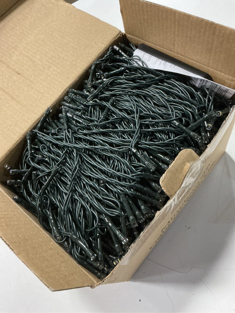 Condition photo showing Good Condition for 66ft 200 led christmas tree lights, twinkle fairy lights string with 8 flashing modes string lights for indoor bedroom outdoor christmas trees garland wreath holiday decorations, warm white warm white_green wire 66 ft