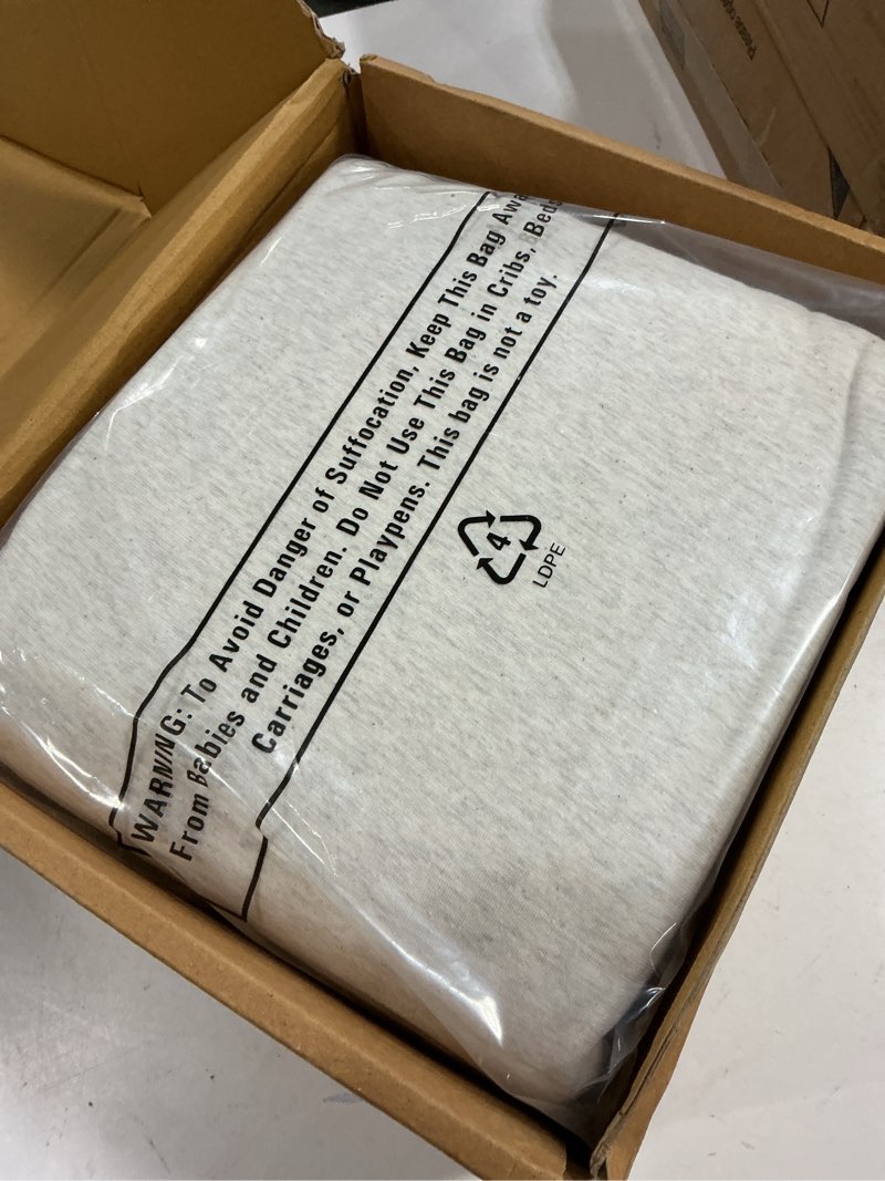 Condition photo showing New/Like New for Amazon Basics 4 Piece Bed Sheets Set, 100% Cotton Jersey, Includes Super Soft, Flat and Fitted Sheets, Pillowcase, King, Oatmeal, Solid King Oatmeal