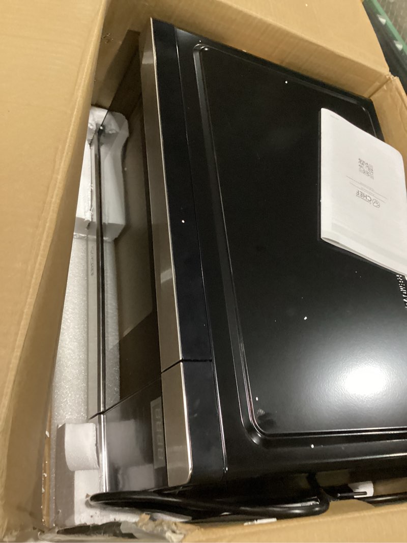 Condition photo showing As Is for *not tested* Commercial CHEF Countertop Microwave, 1.1 Cubic Feet, Black With Stainless Steel Trim Stainless Steel 1.1 Cubic Feet