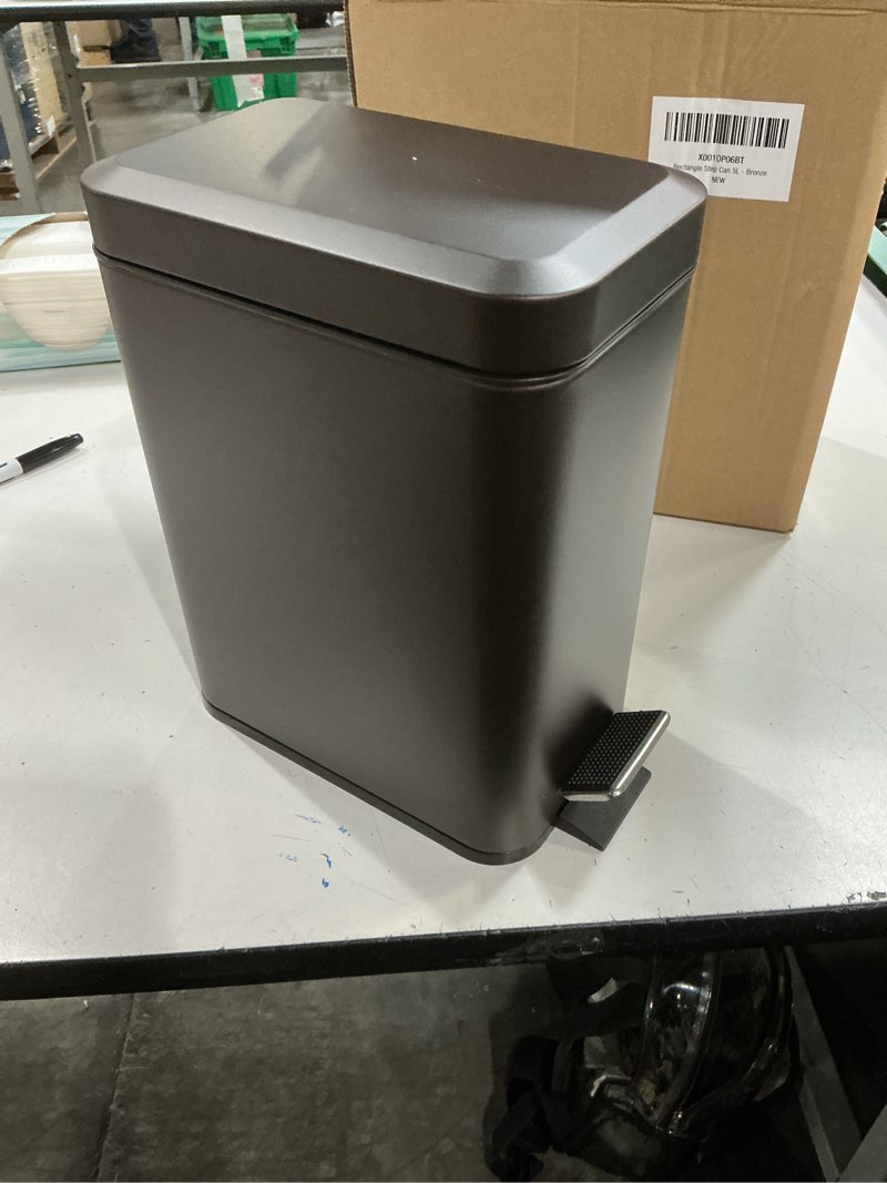 Condition photo showing New/Like New for mdesign small modern 1.3 gallon rectangle metal lidded step trash can, compact garbage bin with removable liner bucket and handle for bathroom, kitchen, craft room, office, garage - bronze bronze 1.3 gallon