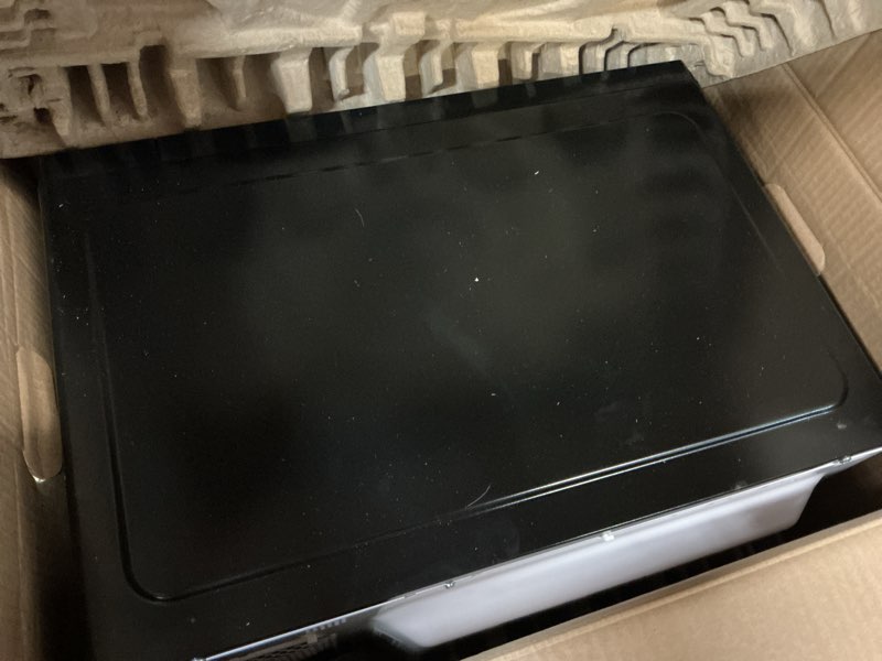 Condition photo showing As Is for hamilton beach 1.1 cu ft countertop microwave oven in black stainless steel