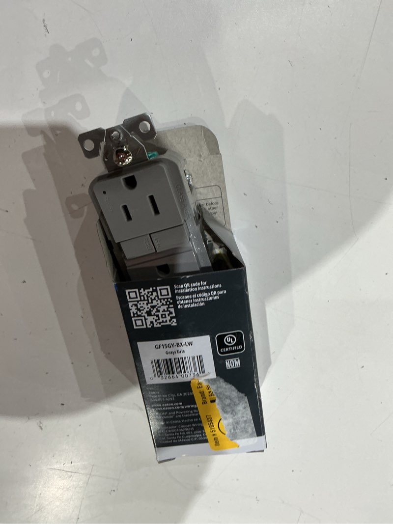 Condition photo showing As Is for eaton 15-amp 125-volt gfci residential decorator outlet, gray