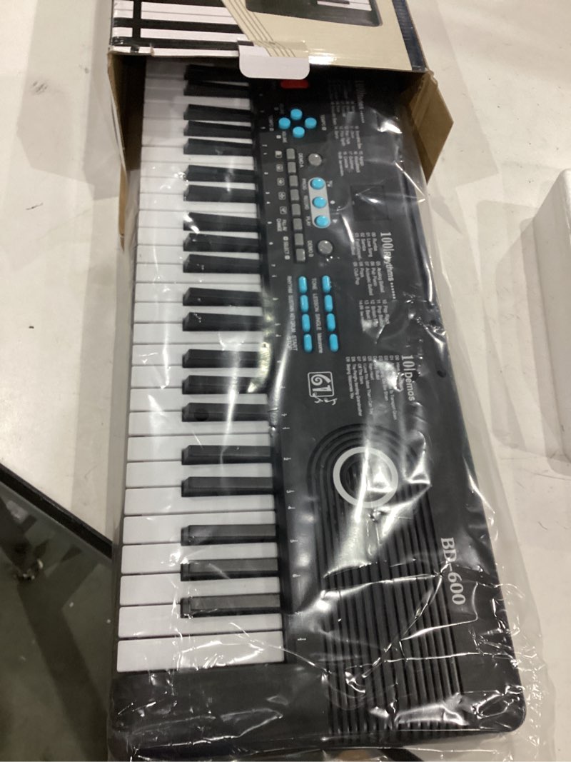 Condition photo showing Good Condition for 61 key keyboard piano,portable electronic digital piano,built in dual speakers,external microphone,power plug,rich teaching content,multi-functional electronic piano suitable for beginners iiw88 black