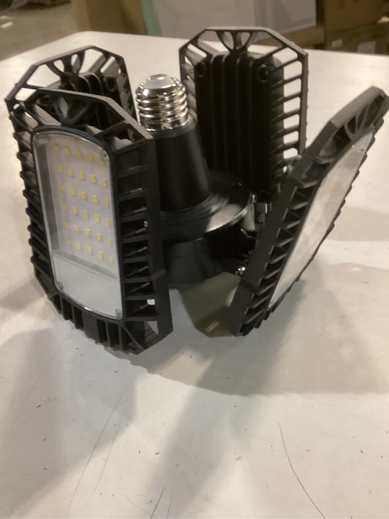 Condition photo showing As Is for Utilitech 1-ft 12000-Lumen Black 4-Light LED Diffuser Garage Shop Light