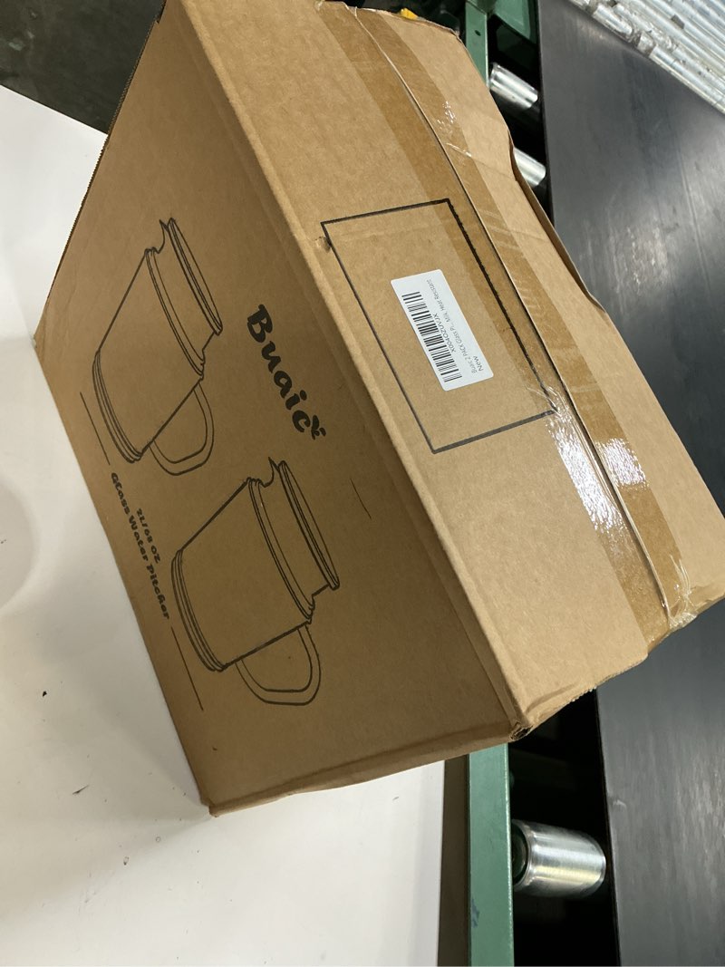 Condition photo showing New/Like New for buaic 2 pack glass pitcher with lid, 68 oz/ 2 liter spiral pattern water pitcher,glass water carafe for cold brew, coffee, lemonade, iced sun tea,beverage, milk, heat resistant clear 2l- spiral pattern design