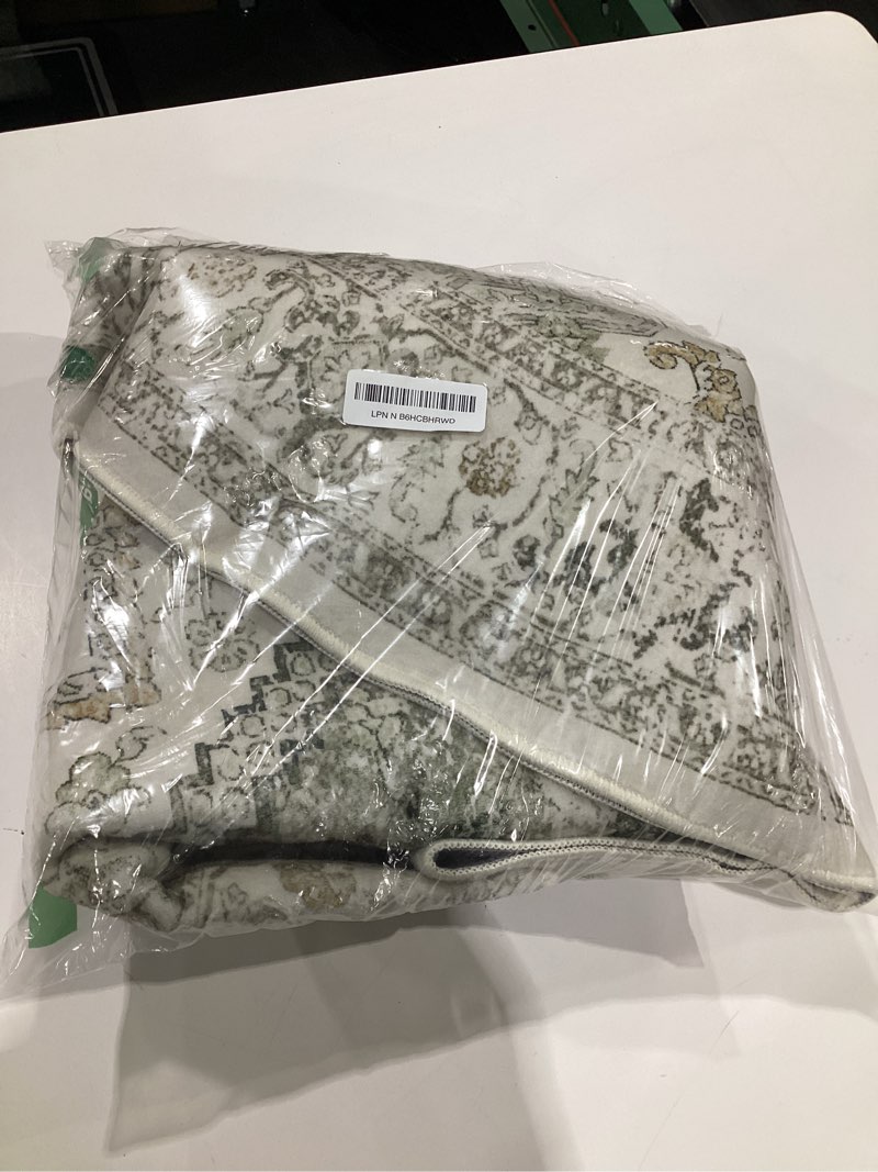 Condition photo showing New/Like New for LIVEBOX Medallion Round Area Rug 5ft, Vintage Washable Sage Green Circle Rug for Bedroom, Low-Pile Soft Round Carpet for Living Room, Ideal for High Traffic Areas in Entryway 5' (Round) Medallion Sage
