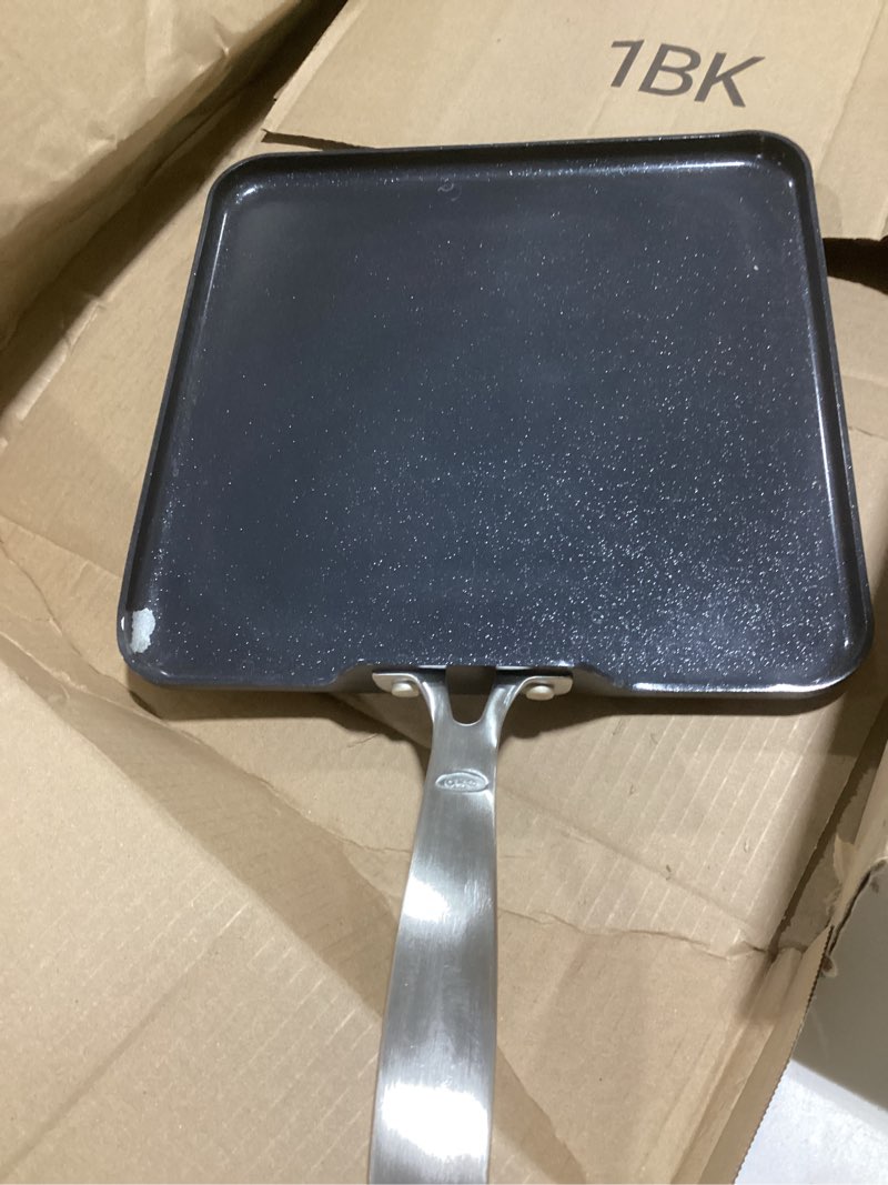 Condition photo showing As Is for OXO Enhanced 11" Griddle Pan, PFAS-Free Ceramic Nonstick, Durable Hard Anodized Cookware, Scratch Resistant, Stainless Steel Handle, Good Grips, Dishwasher Safe, Oven safe, Black