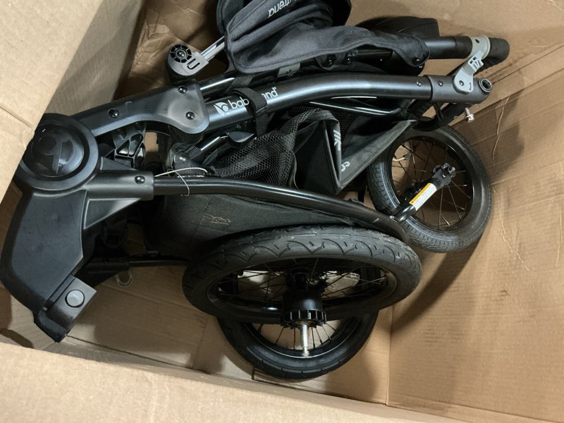 Condition photo showing As Is for baby trend expedition® race tec™ plus jogger travel system with ez-lift™ plus infant car seat, ultra black travel system ultra black plus