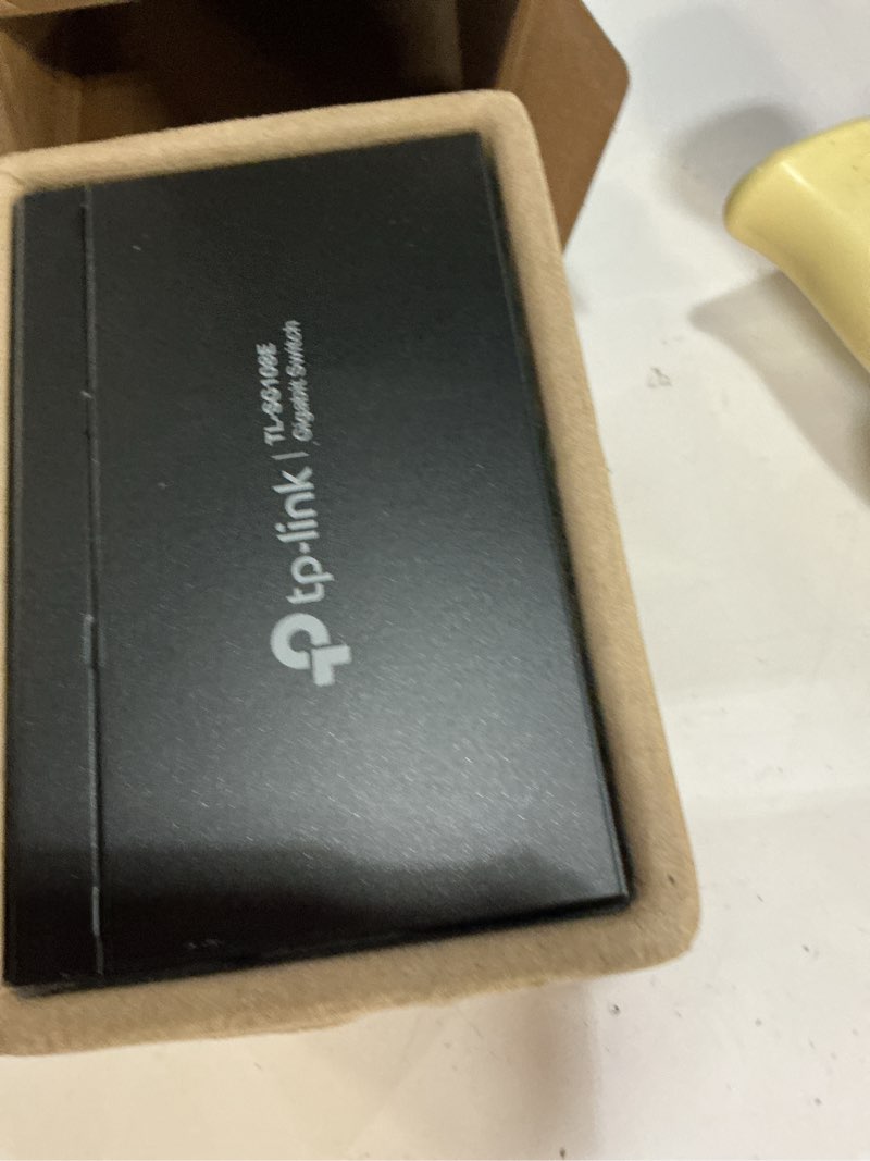 Condition photo showing As Is for tp-link 8 port gigabit switch | easy smart managed | plug & play | desktop/wall-mount | sturdy metal w/ shielded ports | support qos, vlan, igmp and lag (tl-sg108e) 8 port | enhanced features