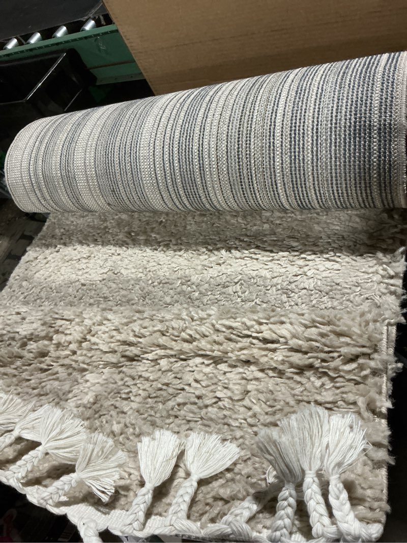 Condition photo showing As Is for nuloom neva solid 2x12 runner shag rug for living room bedroom dining room nursery entryway hallway, beige/ivory neva beige 2' x 12'