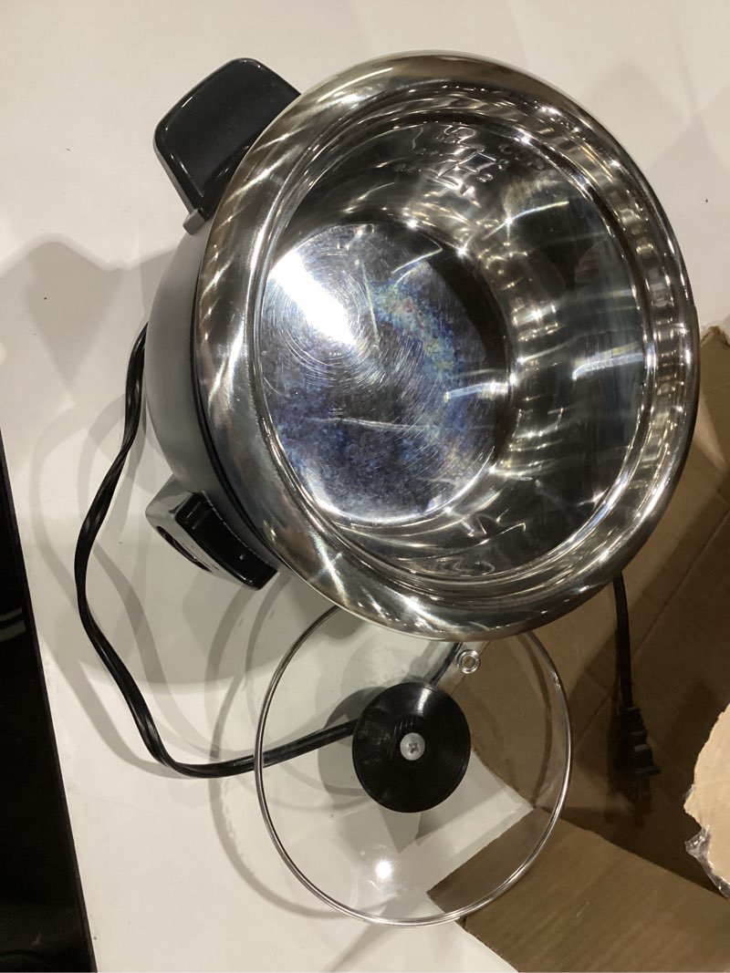 Condition photo showing As Is for USED Elite Gourmet ERC006SS 6-Cup Electric Rice Cooker with Stainless Steel Inner Pot, Makes Soups, Stews, Porridges, Grains and Cereals, 6 cup (3 cups uncooked), Black 6 Cups Cooked, Stainless Steel Black