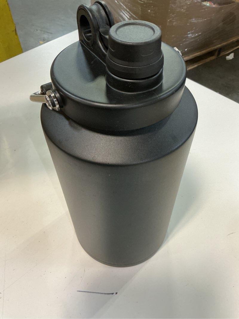 Condition photo showing Good Condition for Kerilyn Insulated Gallon Jug with Handle, One Gallon, 128oz Stainless Steel, Large Double Vacuum Water Bottle for Hot & Cold Drinks, Wide Mouth, Sweat Proof, Great for Travel, Camping, Black Black 128 Ounces
