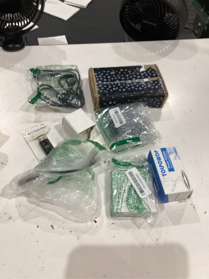 Condition photo showing As Is for assorted lot of electronics (headphones, small gadgets, headsets, etc.) 
