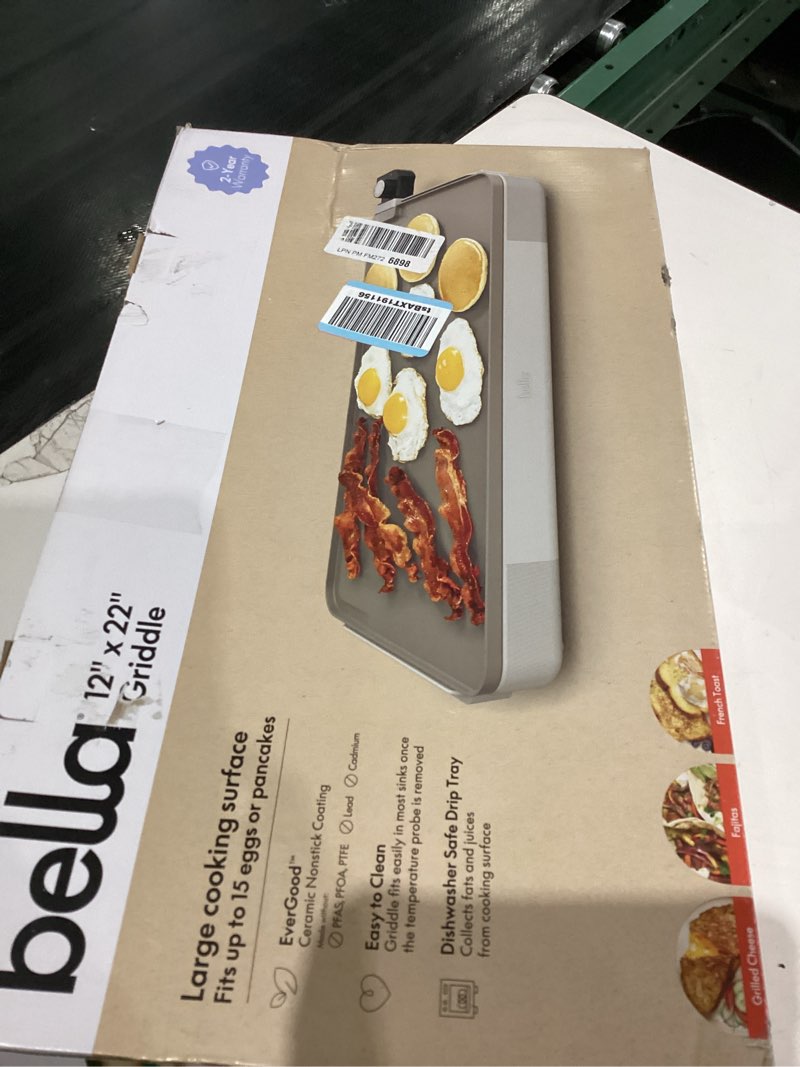Condition photo showing As Is for bella 12" x 22" Electric Griddle with EverGood™ Ceramic Nonstick Coating, Removable Temperature Probe, Dishwasher-Safe Drip Tray & Cool Touch Handles, Cook up to 15 Eggs, 1500 Watt, Oatmilk 12" x 22" Oatmilk