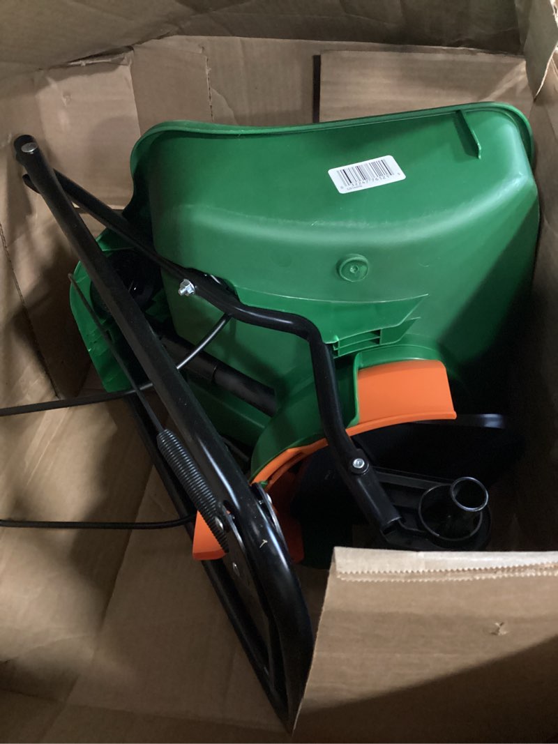 Condition photo showing As Is for Scotts Turf Builder EdgeGuard Mini Broadcast Spreader for Seed, Weed and Feed, Fertilizer, Salt, Ice Melt, Push Spreader Holds up to 5,000 sq.ft. Product