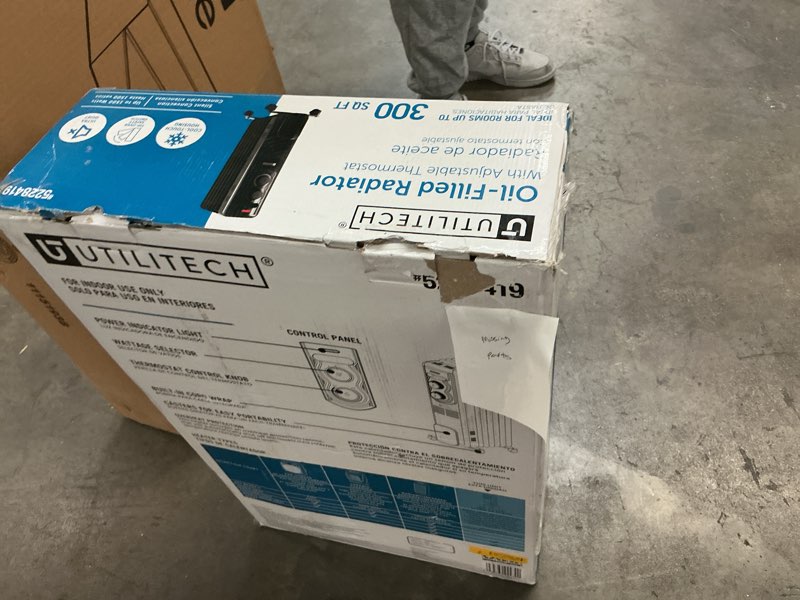 Condition photo showing As Is for Utilitech Up to 1500-Watt Oil-filled Radiant Utility Indoor Electric Space