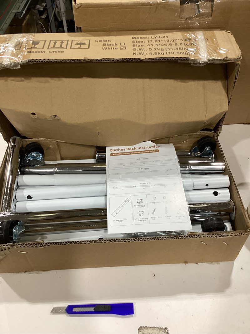 Condition photo showing As Is for Clothing Rack, 55.51 Inch Heavy Duty Clothes Rack Rolling Garment Rack with Wheels and Bottom Shelf, 130LB Capacity Clothes Racks for Hanging Clothes, Coats, Shirts, Sweaters, Skirts, White White Single