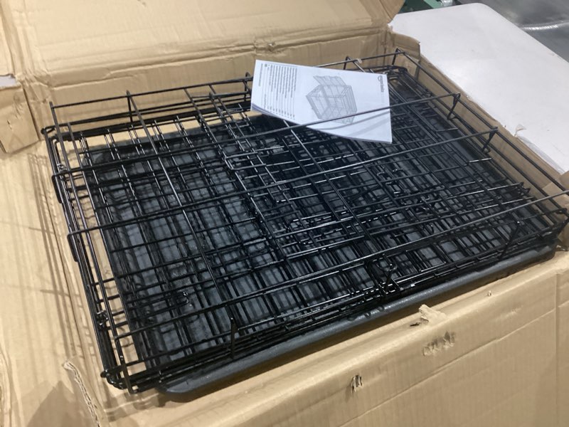 Condition photo showing Good Condition for amazon basics portable, foldable metal wire small dog crate with removable tray, divider panel, single door, easy to assemble, 24" x 18" x 20", black