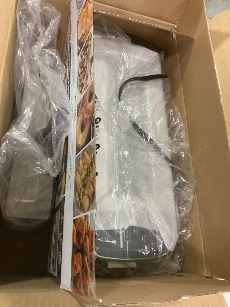 Condition photo showing Good Condition for Ninja ST101 Foodi 2-in-1 Flip Toaster, 2-Slice Capacity, Compact Toaster Oven, Snack Maker, Reheat, Defrost, 1500 Watts, Stainless Steel, 6 Functions