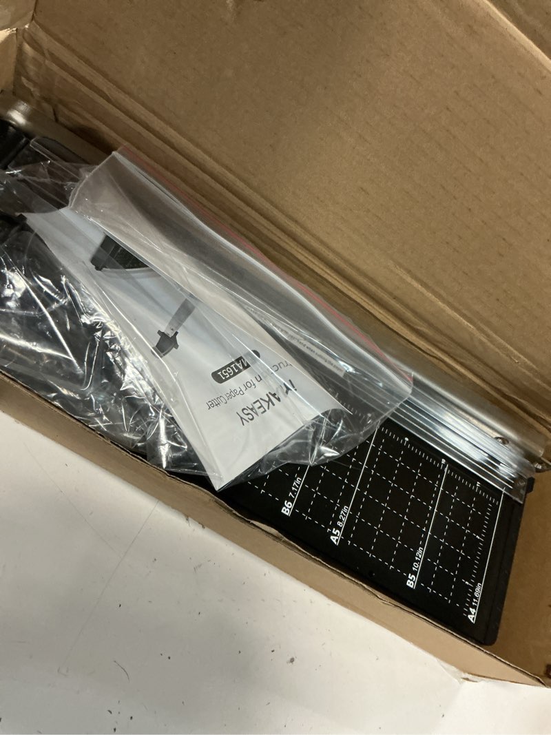 Condition photo showing Good Condition for MAKEASY Paper Cutter 12 Inch, 8 Sheet Capacity, Heavy Duty Paper Cutter for Cardstock, Guillotine Paper Trimmer for Crafting, Classroom and Office Black