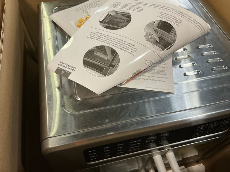 Condition photo showing As Is for dan - emeril lagasse extra large french door air fryer toaster oven combo, 24 cooking functions and digital controls, 7 accessories included, stainless steel finish, 26qt capacity