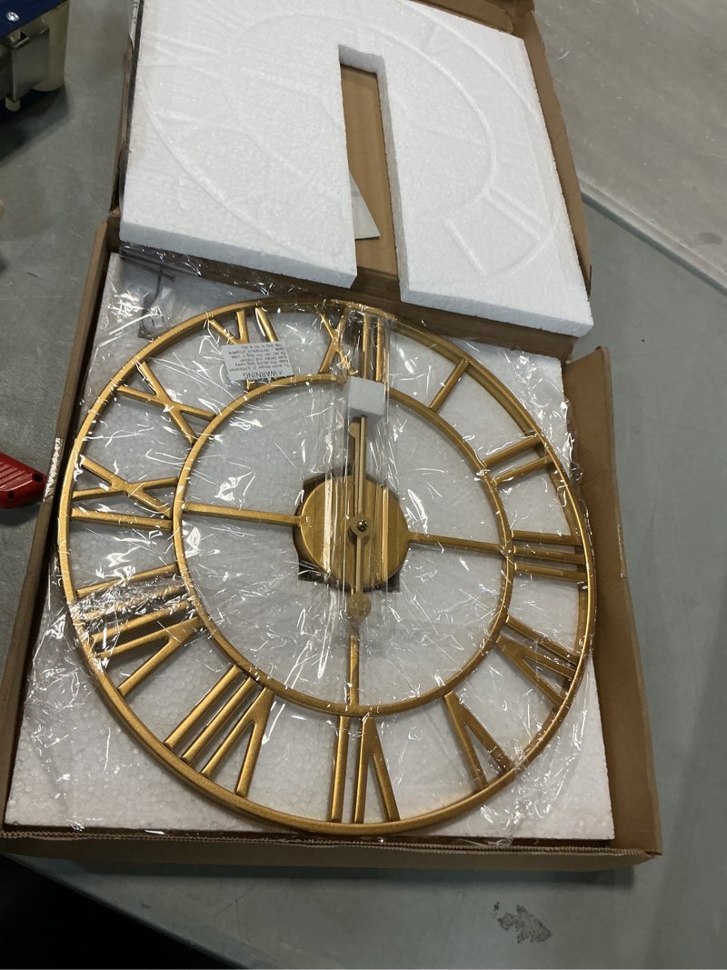 Condition photo showing As Is for 1st owned Large Wall Clock, Metal Retro Roman Numeral Clock, Modern Round Wall Clocks Almost Silent, Easy to Read for Living Room/Home/Kitchen/Bedroom/Office/School Decor (Gold, 16 Inch) Gold 16 Inch