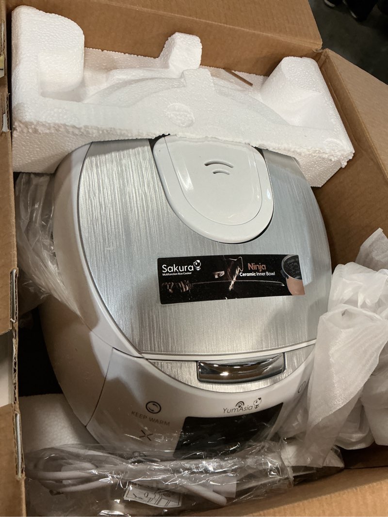 Condition photo showing As Is for Yum Asia Sakura Rice Cooker with Ceramic Bowl and Advanced Fuzzy Logic (8 Cup, 1.5 Litre) 6 Rice Cook Functions, 6 Multicook Functions, Motouch LED Display, 120V Power (White and Siver) White and Silver
