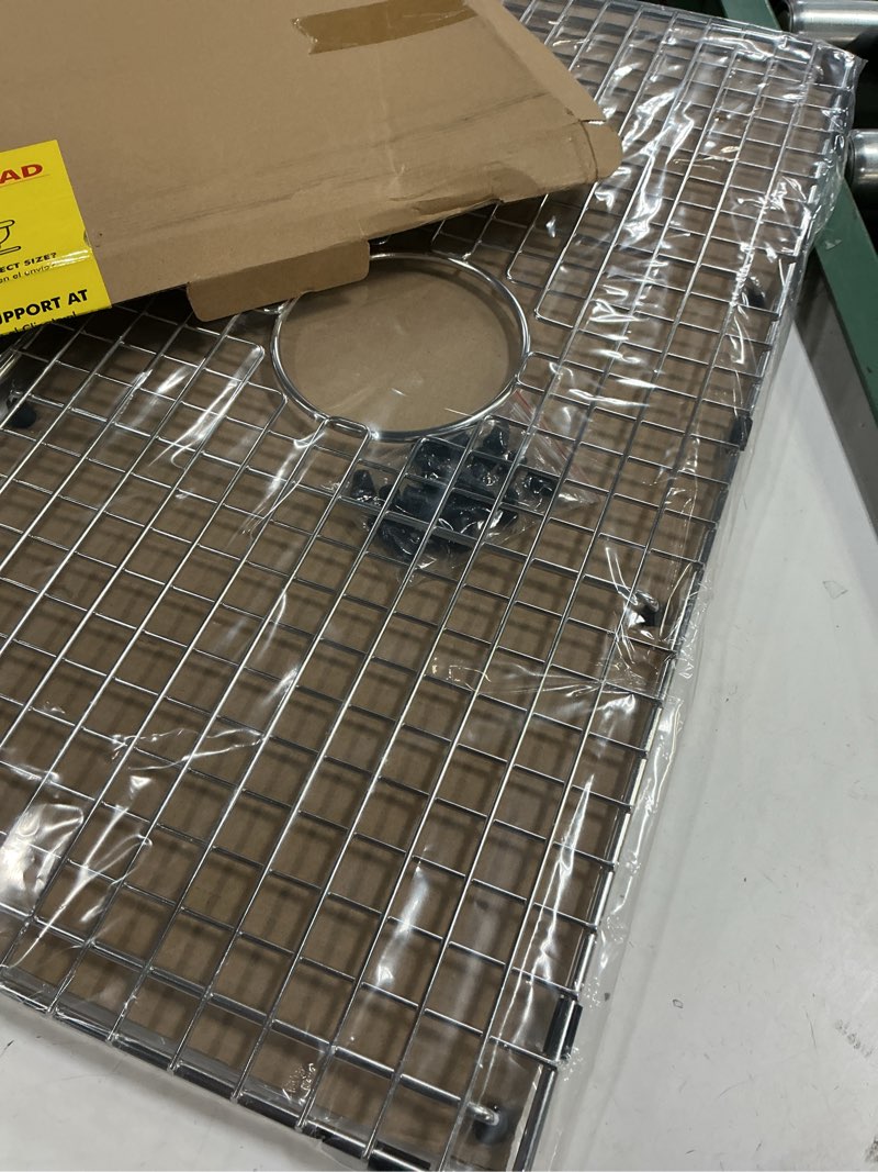 Condition photo showing New/Like New for serene valley sink bottom grid 27-9/16" x 14-7/16", centered drain with corner radius 3/8", sink protector svh2815c