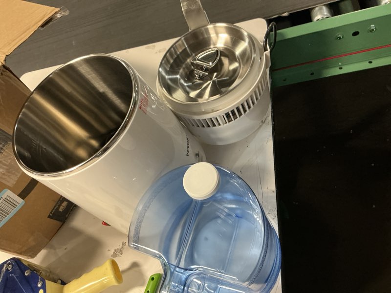 Condition photo showing As Is for VEVOR Water Distiller, 1.1 Gal Distilled Water Machine, 750W Pure Water Distilling w/BPA Free Plastic Container, Water Distillation Kit w/Button, Countertop Distilled Water Maker for Home, White
