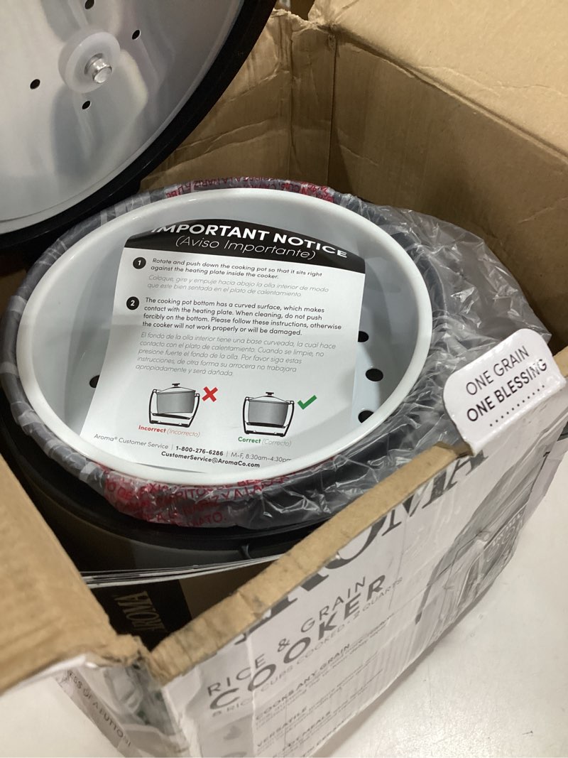 Condition photo showing Good Condition for aroma digital rice cooker, 4-cup (uncooked) / 8-cup (cooked), steamer, grain cooker, multicooker, 2 qt, stainless steel exterior, arc-914sbd 4 cup uncooked / 8 cup cooked