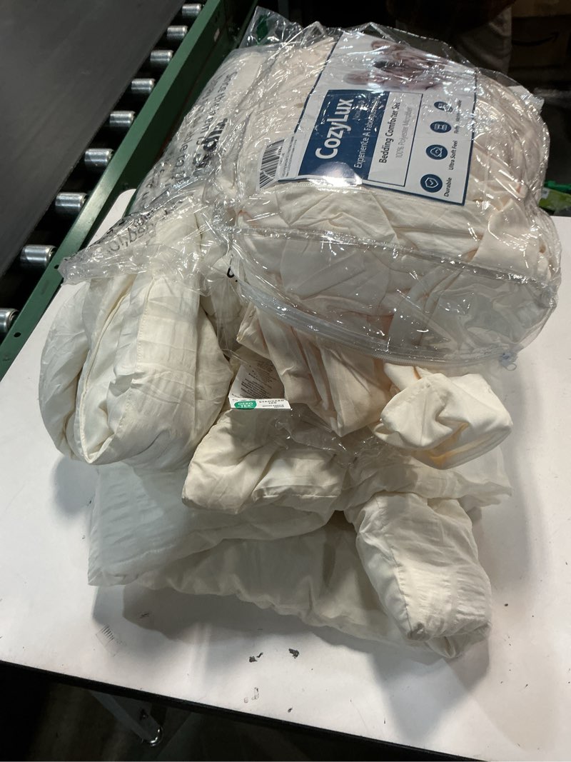 Condition photo showing As Is for CozyLux King Size Comforter Set Ivory Seersucker 7 Pieces Bed in a Bag King Comforter Set with Sheets, Luxury Soft Bedding Set with Down Alternative Comforter, Sheets, Pillowcases & Shams All Seasons Ivory King