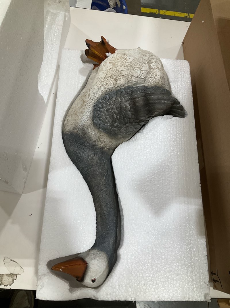 Condition photo showing Good Condition for bits and pieces 19" porch goose with motion sensor and honking sound - weather resistant polyresin outdoor garden decor, motion activated patio decor, 19 inches tall x 10.5 inches wide