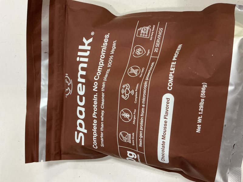 Condition photo showing New/Like New for spacemilk chocolate mousse vegan protein powder, 20g complete protein, pdcaas 1.0, zero sugar, allergen-free, dairy-free, gluten-free, non-gmo, no bloating, 20 servings (1.29 lbs) chocolate 1.29 pound (pack of 1)( bb 02//2028)