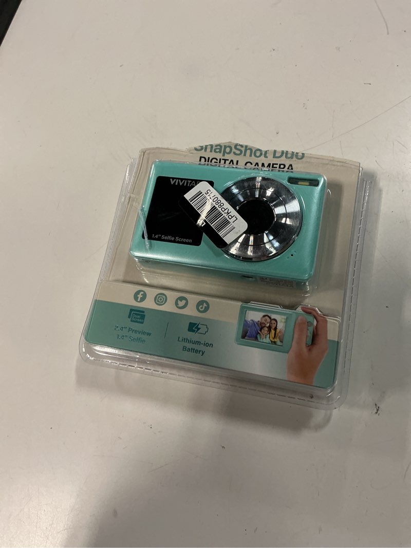 Condition photo showing As Is for vivitar snapshot duo digital camera - soft aqua