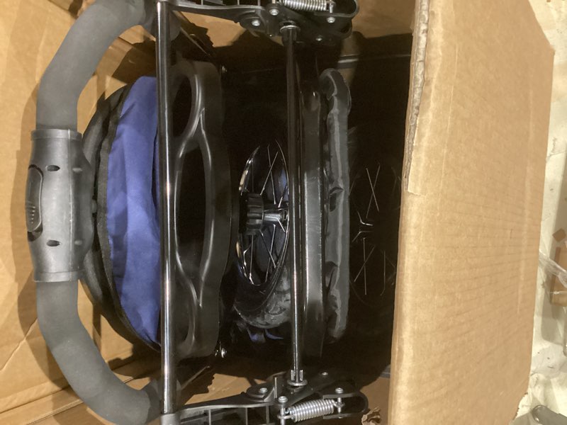 Condition photo showing As Is for pet gear no-zip jogger pet stroller for cats/dogs, zipperless entry, airless tires, easy one-hand fold, cup holder + storage basket, navy