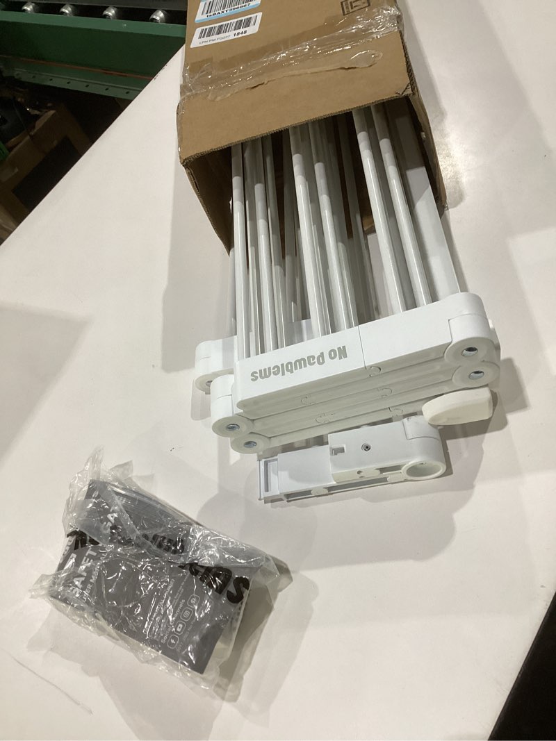 Condition photo showing As Is for no pawblems retractable safty gate, metal adjustable dog gate for doorways, stairs & hallways, expands to 45" wide, 36" tall gate, auto retract design, no bottom bar, white white 45" wide, 36" tall