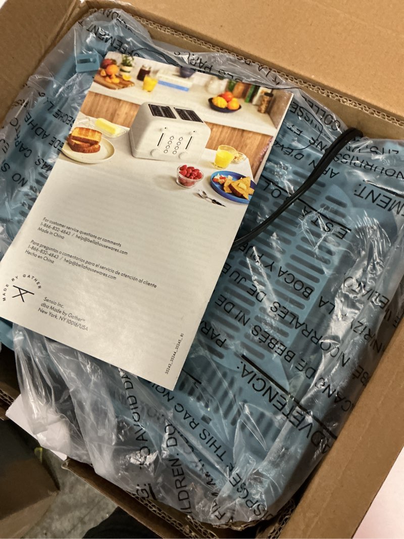 Condition photo showing Good Condition for bella 4 slice toaster, 6 setting shade control with reheat & cancel buttons, removable crumb tray, anti jam & auto shutoff, 900 watt, surf