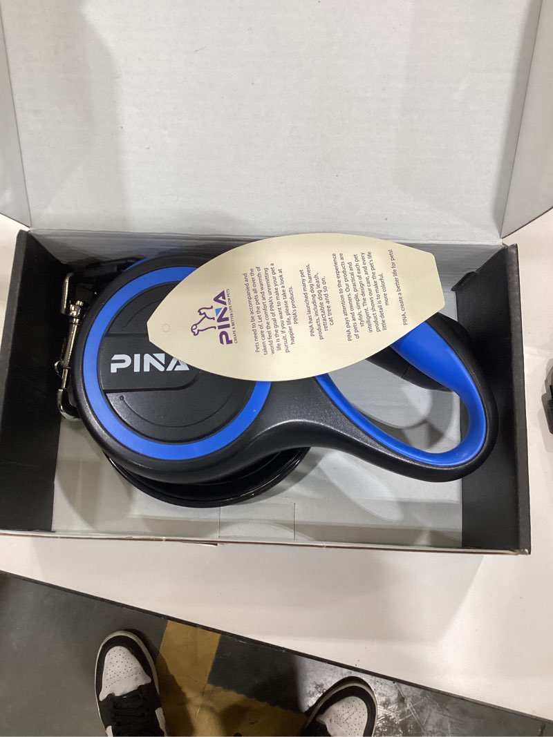 Condition photo showing New/Like New for PINA Retractable Dog Leash, 26ft Dog Leash for Small Medium Large Dogs Up to 110lbs, 360° Tangle-Free Strong Reflective Nylon Tape, with Anti-Slip Handle, One-Handed Brake, Lock - Black Blue 26 ft Black Blue