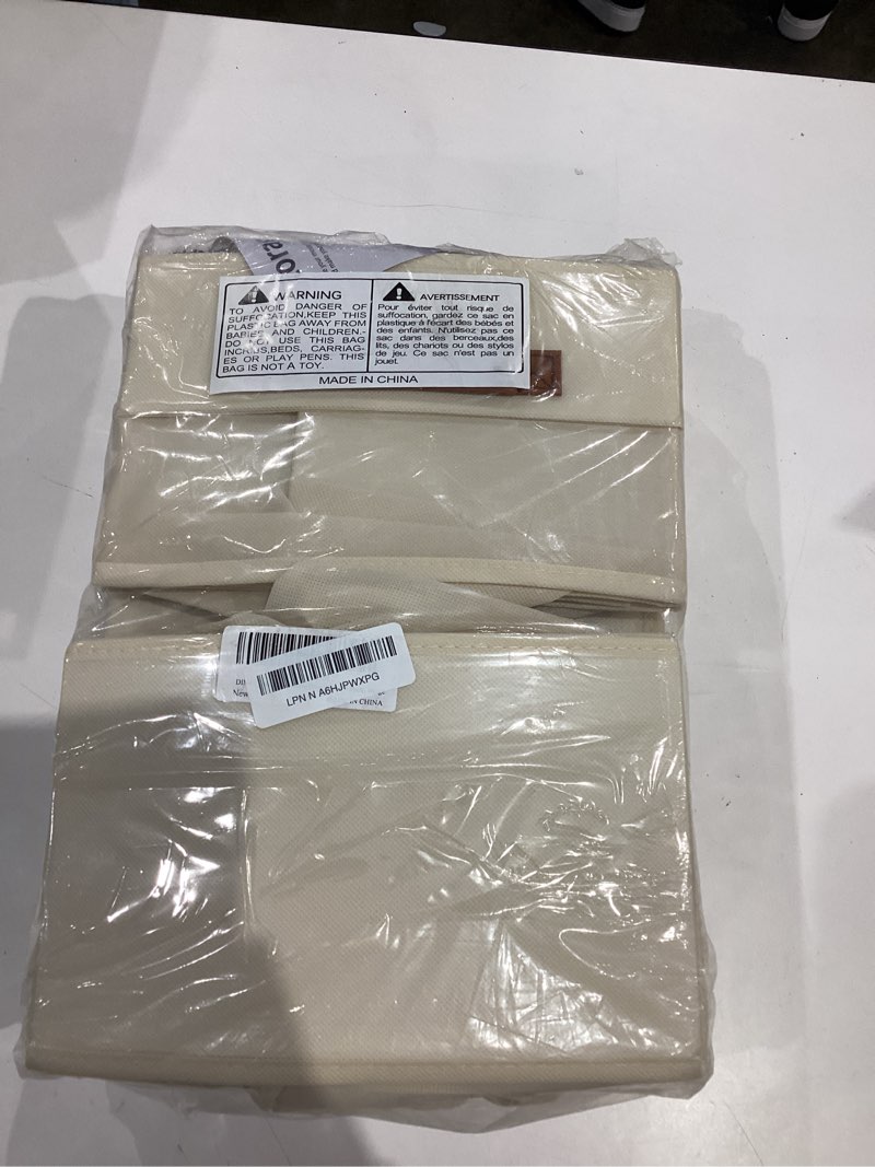 Condition photo showing Good Condition for DIMJ Closet Organizers and Storage - Pull-out Fabric Bins with Drawers for Closet Foldable Clothes Organizers with Clear Window, Stackable Storage Drawers for Bedroom,Living Room,Shelf,4-Pack, Beige 4 Pack Beige