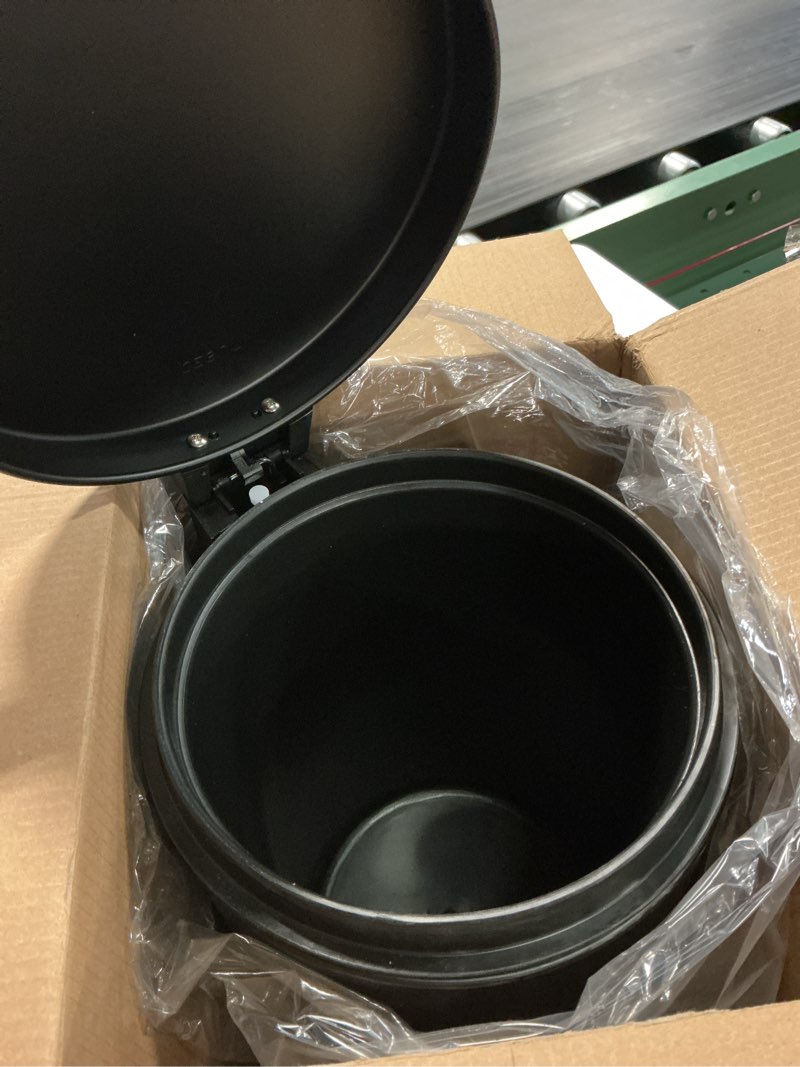 Condition photo showing New/Like New for cesun 1.2 gallons small black trash can, bathroom garbage can with lid and foot pedal, mini round wastebasket for bathroom, bedroom, office, 4.5 liters / 1.2 gallons, matte black