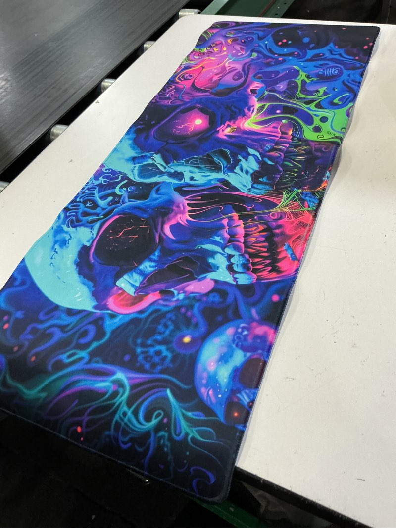 Condition photo showing Good Condition for simpkeely horror skull mouse pad, large waterproof blacklight colorful skeleton neon gaming non-slip rubber base mousemat, glow in the dark abstract desk mat for office home - 31.5 x 11.8 inches