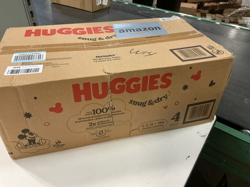 Condition photo showing New/Like New for Huggies Size 4 Diapers, Snug & Dry Baby Diapers, Size 4 (22-37 lbs), 186 Count (6 Packs of 31), Packaging May Vary Size 4 186