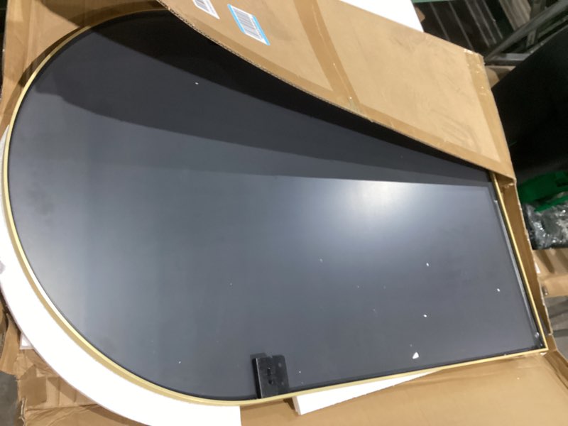 large, gold-framed mirror