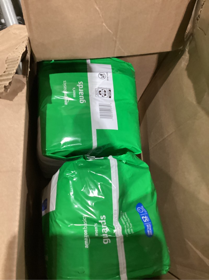Condition photo showing New/Like New for amazon basics men's incontinence guards, maximum absorbency, 104 count, (2 packs of 52)