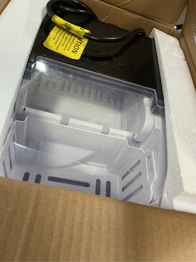 Condition photo showing As Is for euhomy countertop ice maker machine with handle, 26lbs in 24hrs, 9 ice cubes ready in 6 mins, auto-cleaning portable ice maker with basket and scoop, for home/kitchen/camping/rv. (black) black 26lbs