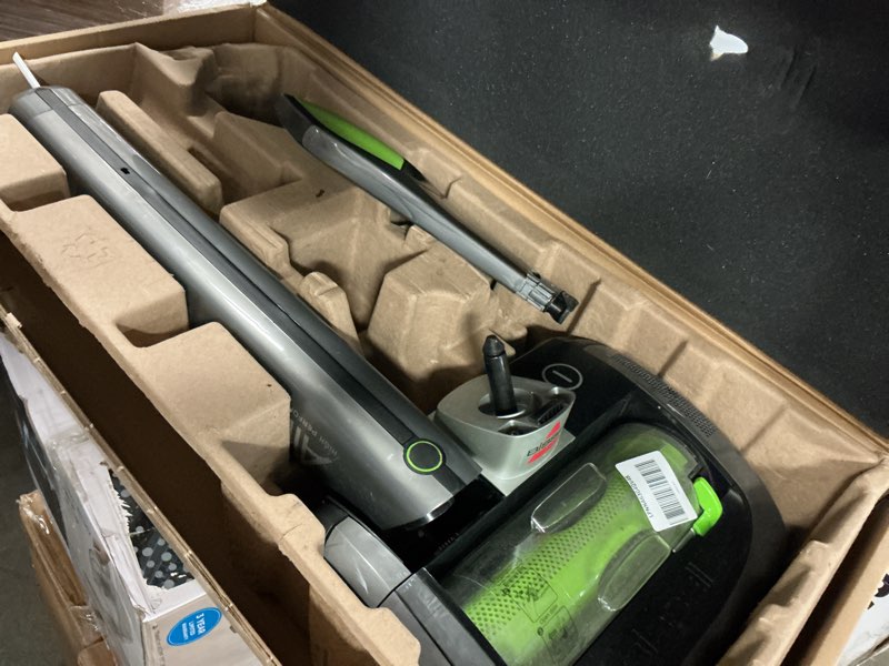 Condition photo showing As Is for bissell 1984 air ram cordless vacuum, green air ram